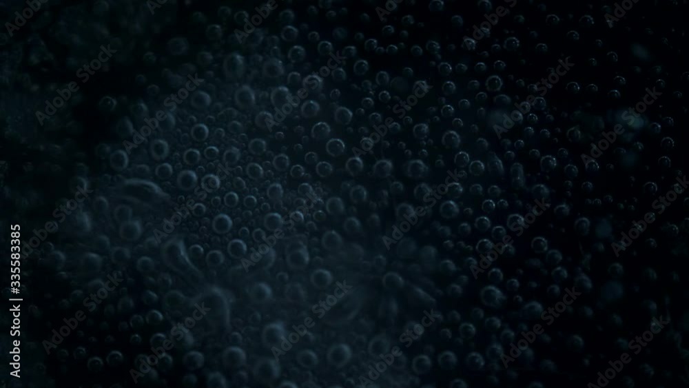 Boiling water bubbles rising in a pan Boiling water bubbles rising in a pan