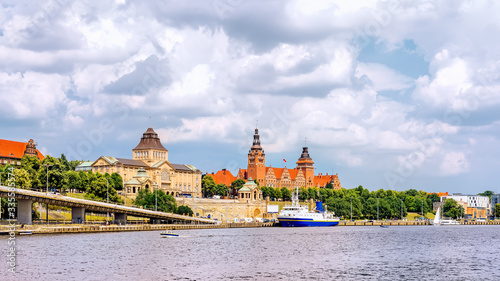 Cruise ship docked on Rampart of Brave embankment. National Museum and West Pomeranian Regional Authority and Passport Office in background, Szczecin