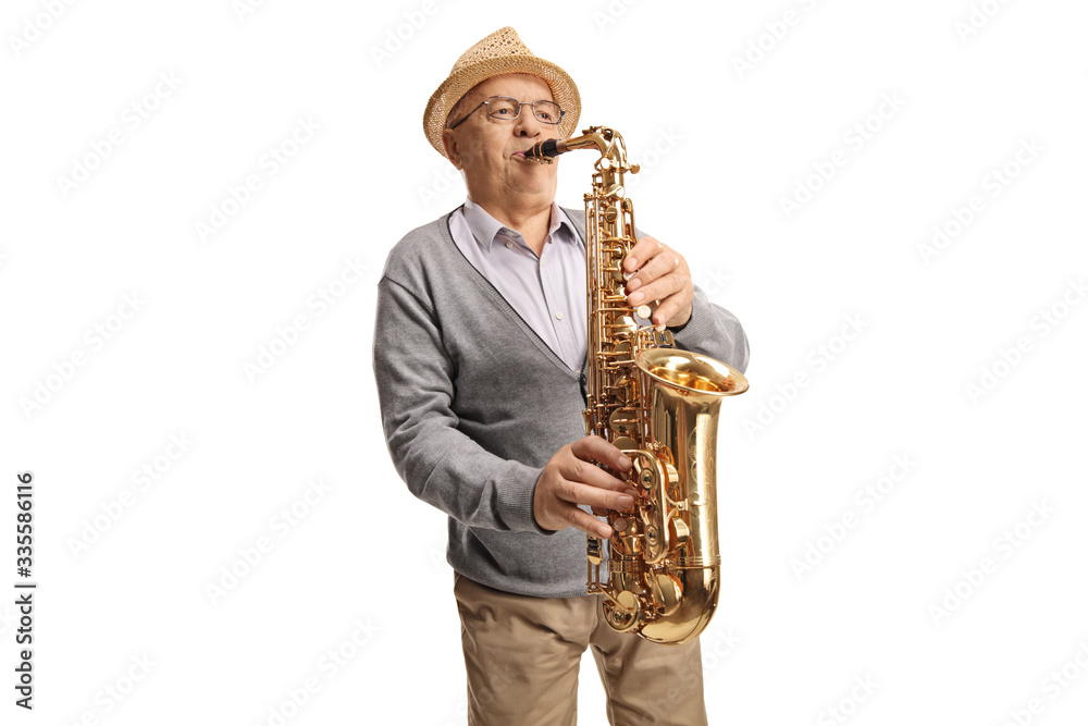 Naklejka premium Senior man playing a saxophone
