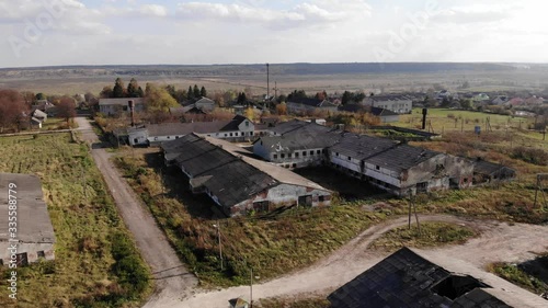 Aerial Drone View Of Abandoned Stables Of The Bankrupt Collective Farm. Pull Out photo