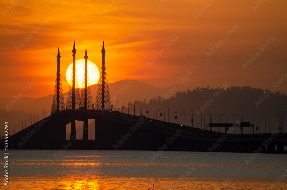 Egg yolk sunrise at Penang Bridge.