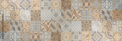 Brown beige gray bright vintage retro geometric square mosaic motif cement tiles texture background banner panorama