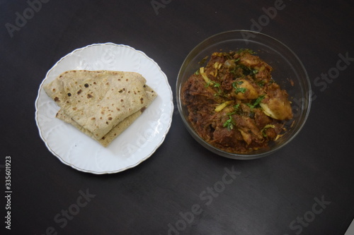 homemade spicy chicken karahi with chappatti 