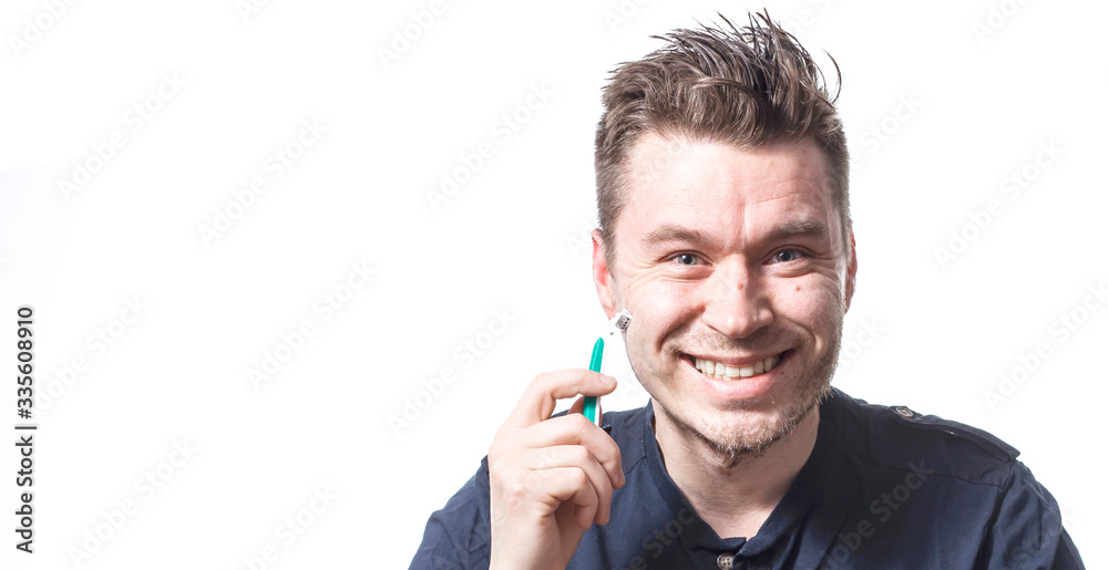 Portrait of man getting hurt while shaving with a razor Portrait of man getting hurt while shaving with a razor