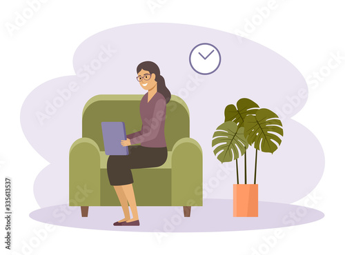 Female freelancer is working on a tablet. Distance job