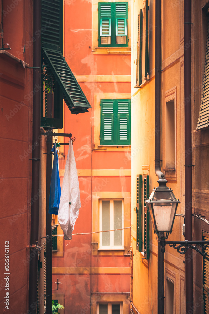 Fototapeta premium Laundry hung outside to air and dry in Camogli, small Ligurian fishing village, Italy