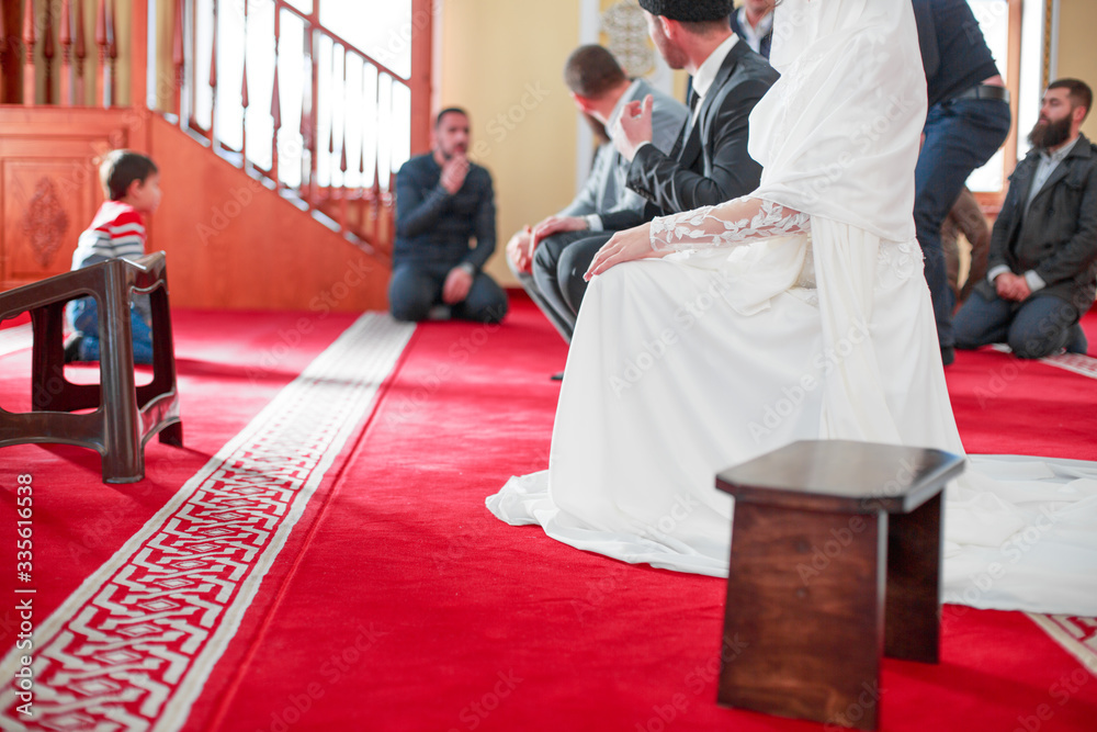Praying arabian people in the mosque. Islamic wedding Praying arabian people in the mosque. Islamic wedding