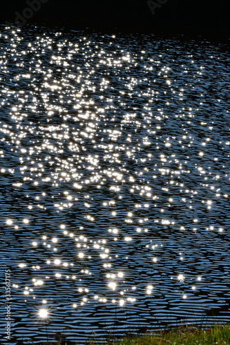 dreamlike day at the lake with beautiful reflections like stars photo