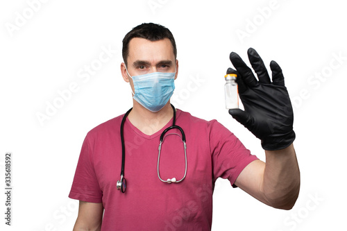 Obraz na płótnie a masked doctor holds a cure for the virus w salonie