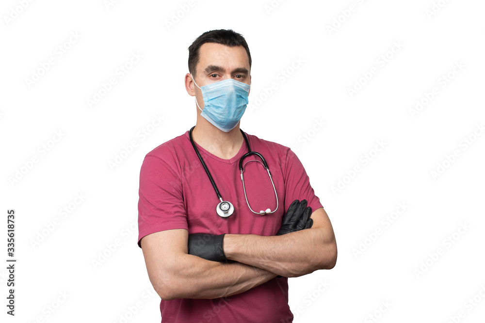 Portrait of a doctor in a surgical mask and medical gloves