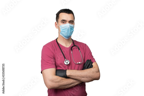 Obraz na płótnie Portrait of a doctor in a surgical mask and medical gloves w salonie