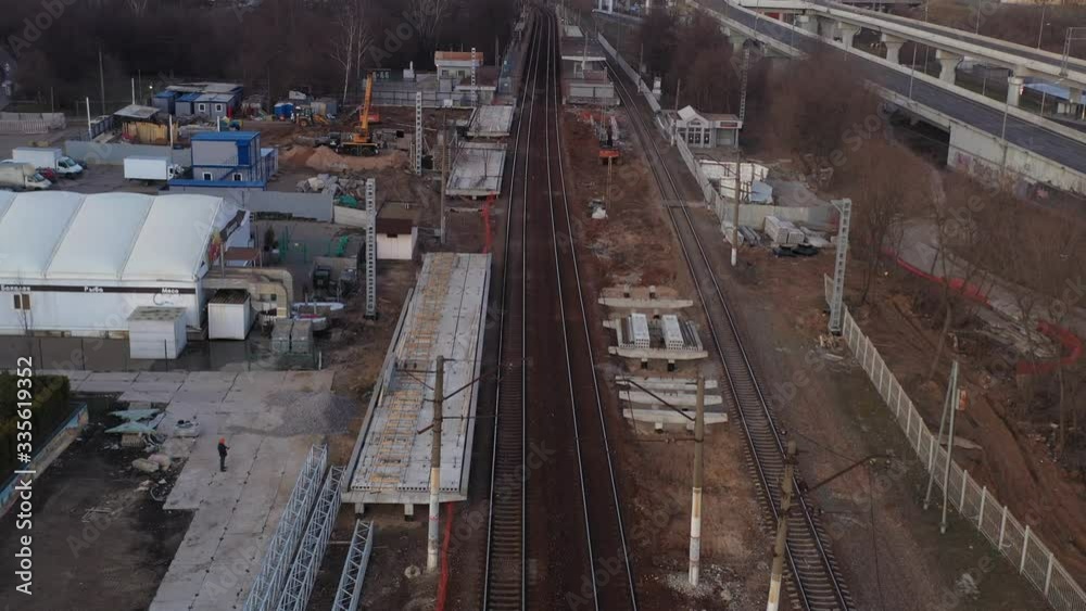 panoramic views from the drone of the railway and the highway of the big city