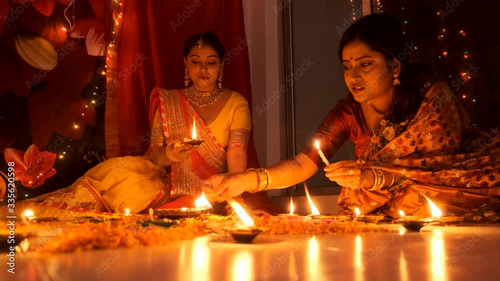 Two beautiful Indian Bengali women in Indian traditional dress