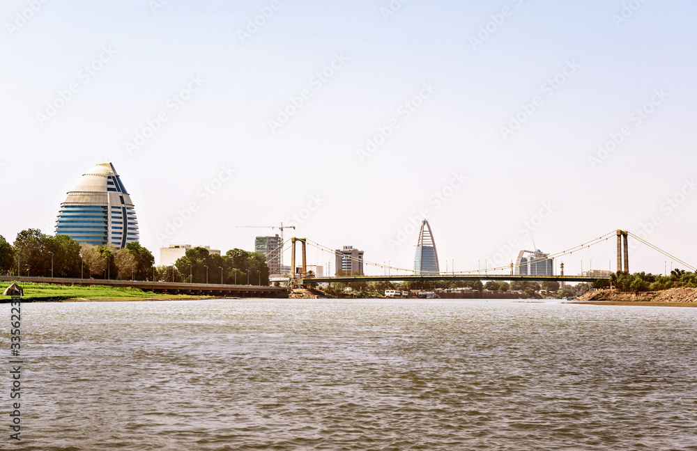 Obraz premium Khartoum city scape with Burj Al Fateh hotel, the bridge over river Nile and modern buildings at the background.