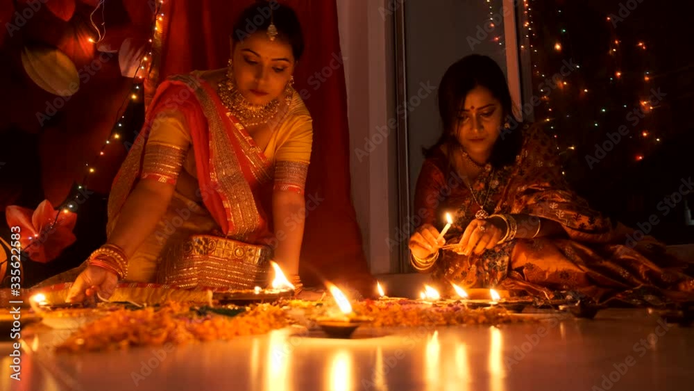 Two beautiful Indian Bengali women in Indian traditional dress