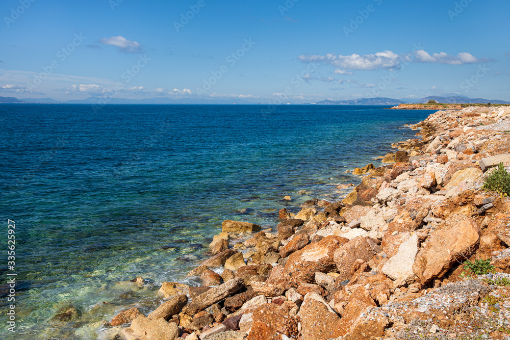 Beautiful spring morning on the rocky seashore of the southern suburbs of Athens, Greece.