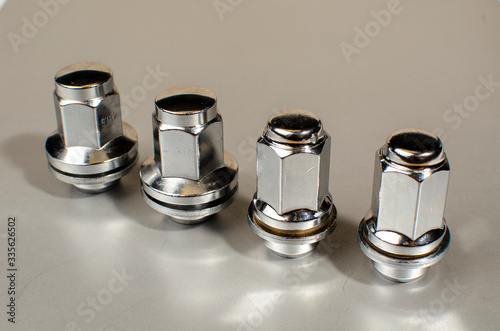 car wheel nuts on a white background