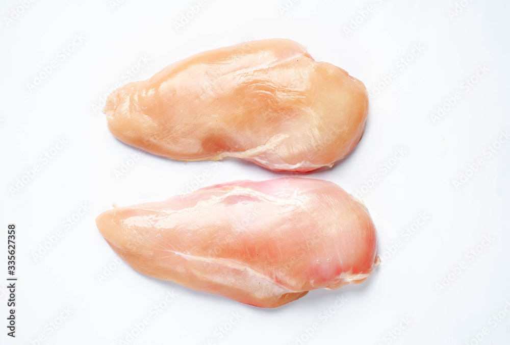 raw chicken breast on a white background, isolate raw chicken breast on a white background, isolate