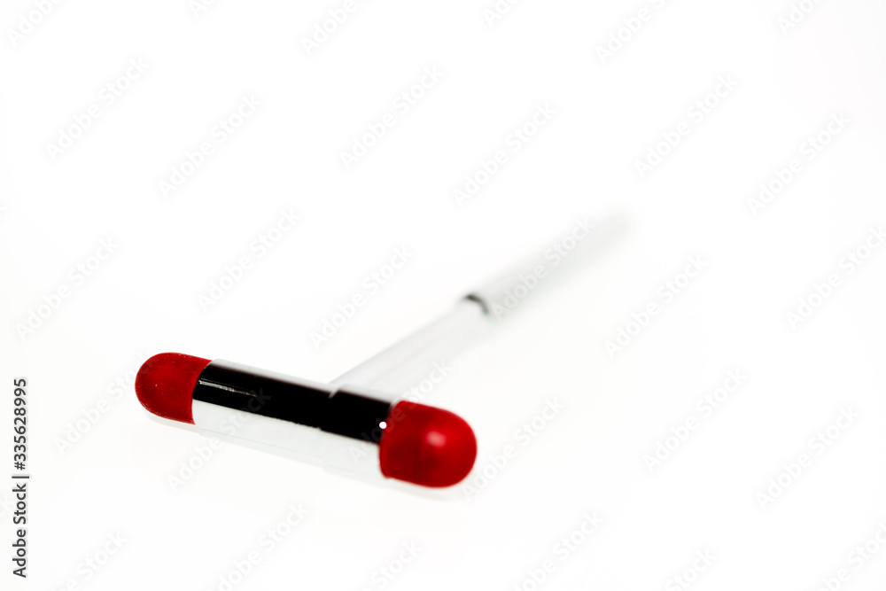 Medical hammer close up, isolated on white background. Medical hammer close up, isolated on white background.