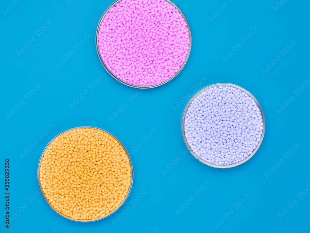 Top view of three chemical bowl with polymer granules Top view of three chemical bowl with polymer granules