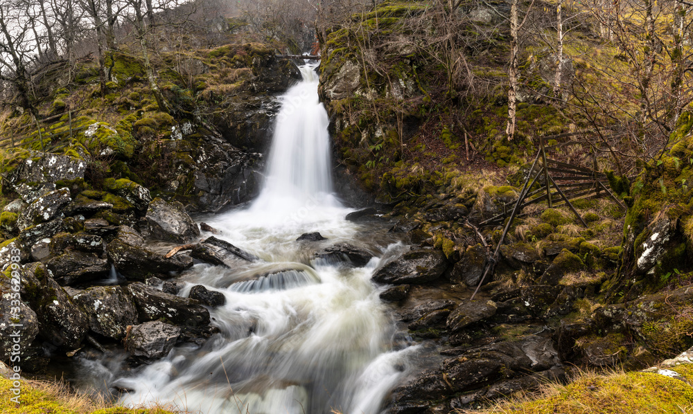 Stunning natural waterfall, Highlands, Scotland Stunning natural waterfall, Highlands, Scotland