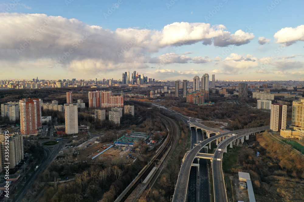 panoramic views from the drone of the railway and the highway of the big city