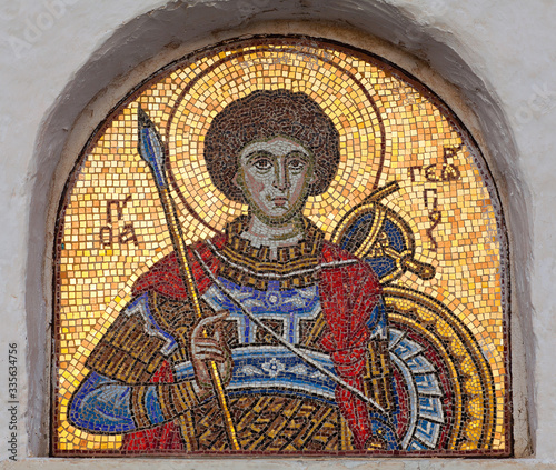 Ancient mosaic icon of Saint George outside of the Panagia Church in Chora, Ios island, Cyclades, Greece photo