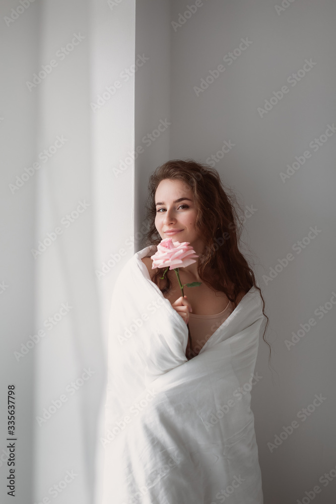 Stock photo - I stay at home awareness social media campaign and coronavirus prevention. Stay home phrase. Girl under the covers in her bed Stock photo - I stay at home awareness social media campaign and coronavirus prevention. Stay home phrase. Girl under the covers in her bed