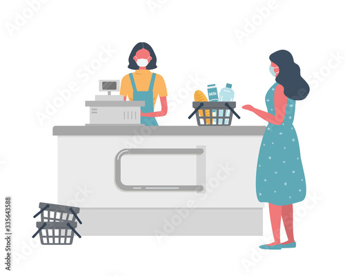Supermarket cashier web banner during coronovirus epidemic. Young woman in a medical mask stands behind a cash register. Customer is also wearing a protective mask.There is a basket with products here photo