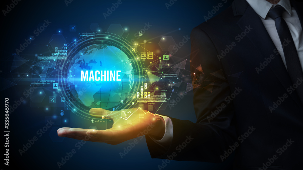 Elegant hand holding MACHINE inscription, digital technology concept Elegant hand holding MACHINE inscription, digital technology concept
