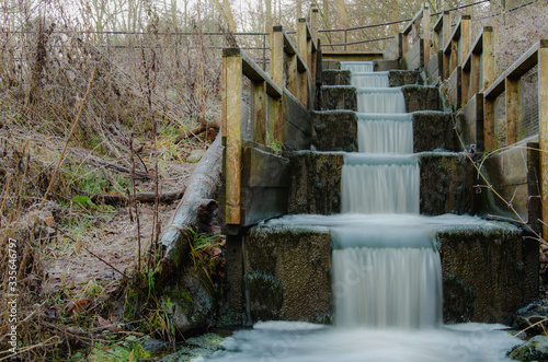 Long exposure photo of a salmon ladder in the cold Swedish spring time.