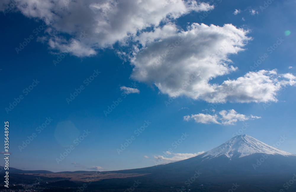A view at the highest mountain in Japan, Mt. Fuji, and its surroundings and clouds