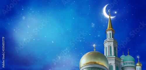 Beautiful Islamic Greeting Cards for Muslim Holidays. Ramadan Kareem background with mosque. Blue banner with moon.