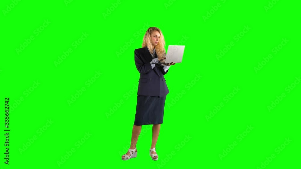 Caucasian businesswoman using a laptop on studio Caucasian businesswoman using a laptop on studio