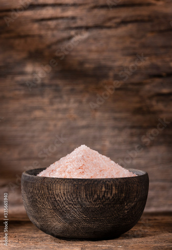 Himalayan pink sea salt in the wooden bowl
