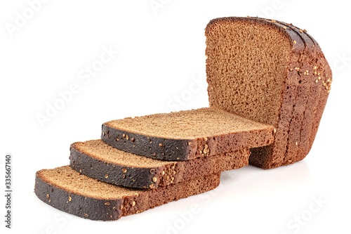 Sliced rye bread with coriander seeds on top isolated on white background with reflection on glossy surface