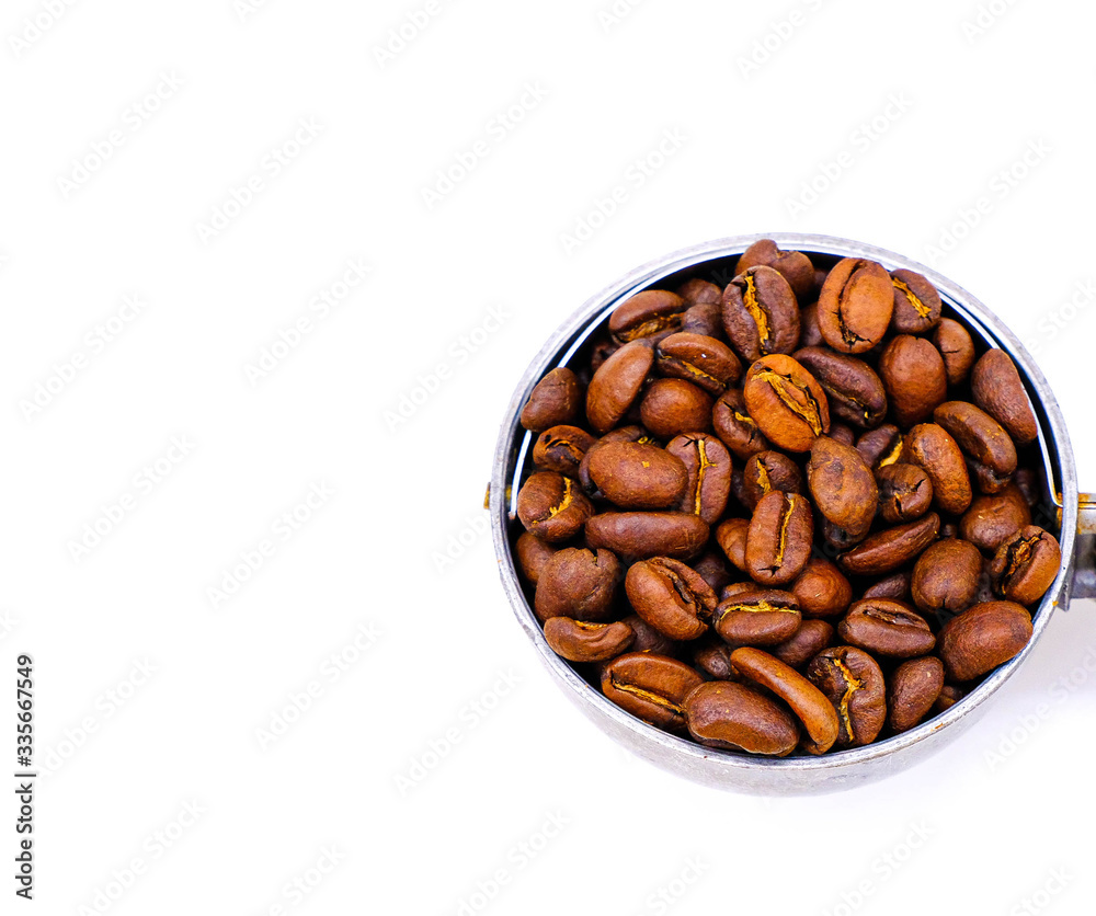 roasted coffee beans in scoop isolated on white background
roasted coffee beans in scoop isolated on white background