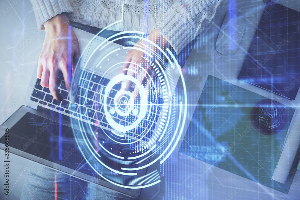 Double exposure of woman hands working on computer and data theme hologram drawing. Top View. Technology concept. Double exposure of woman hands working on computer and data theme hologram drawing. Top View. Technology concept.