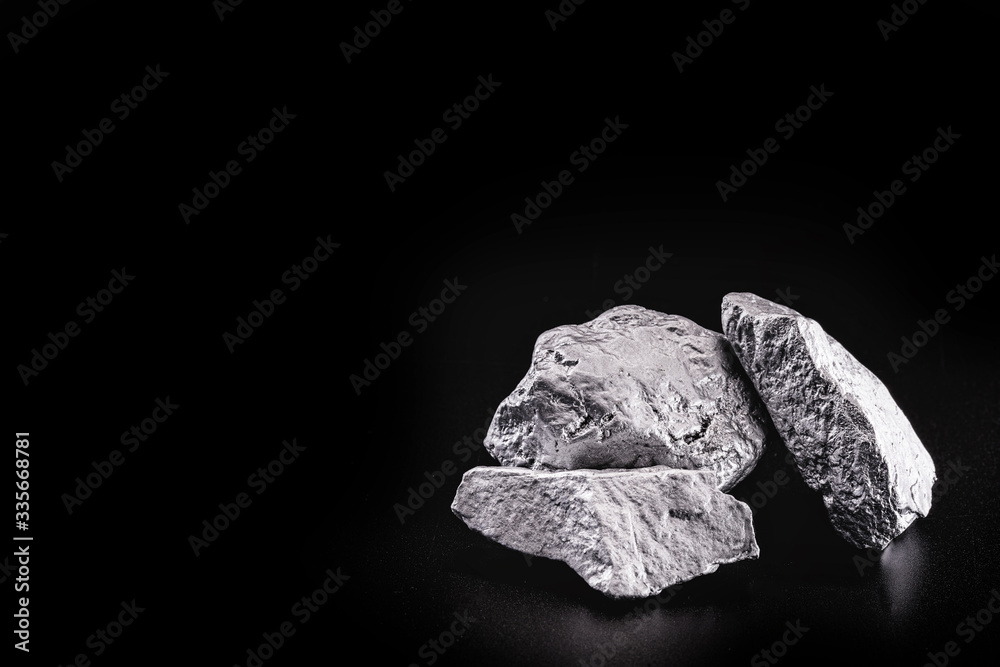 silver nugget native to Liberia isolated on black background. silver nugget native to Liberia isolated on black background.