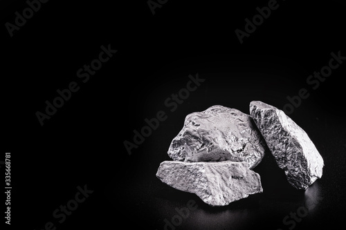 silver nugget native to Liberia isolated on black background.