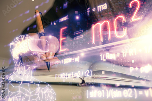 Wallpaper Mural Double exposure of woman hands typing on computer and formula hologram drawing. Education concept. Torontodigital.ca