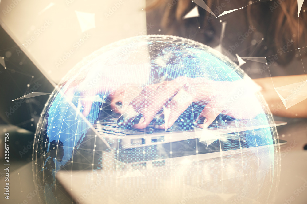 Double exposure of woman hands typing on computer and business theme hologram drawing. Success concept.