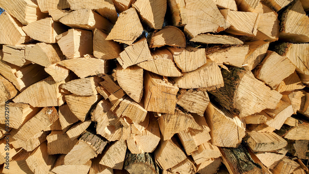 firewood wall that is split and stacked firewood wall that is split and stacked