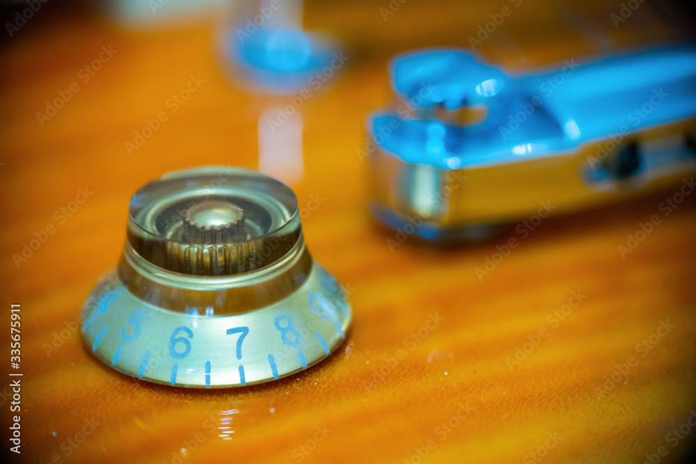 Close up of an electric guitar volume knob Close up of an electric guitar volume knob