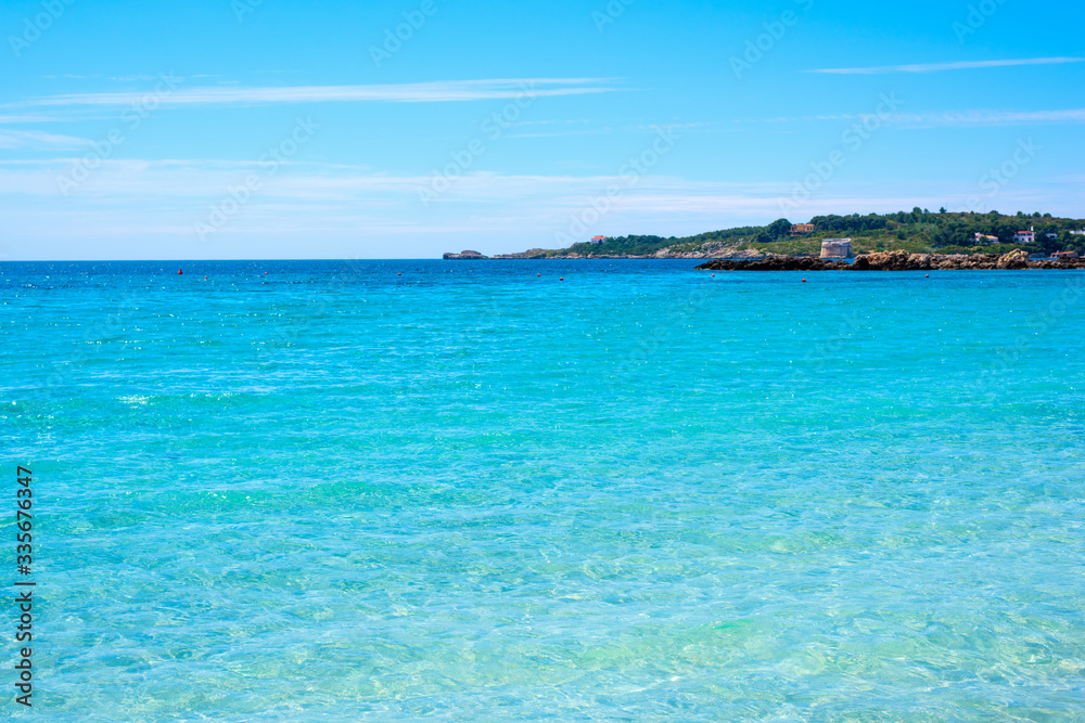 Turquoise water in Le Bombarde beach in Sardinia