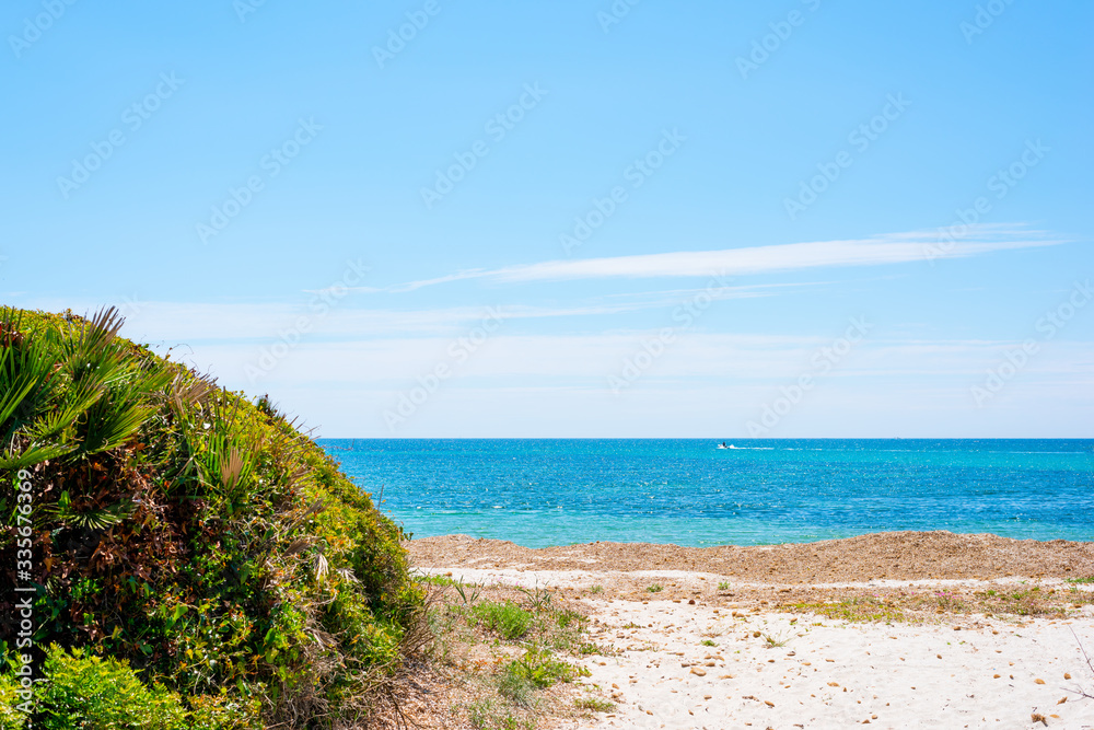 Sun shining over Le Bombarde beach in springtime Sun shining over Le Bombarde beach in springtime