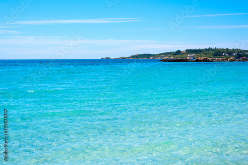 Turquoise water in Le Bombarde beach in Sardinia