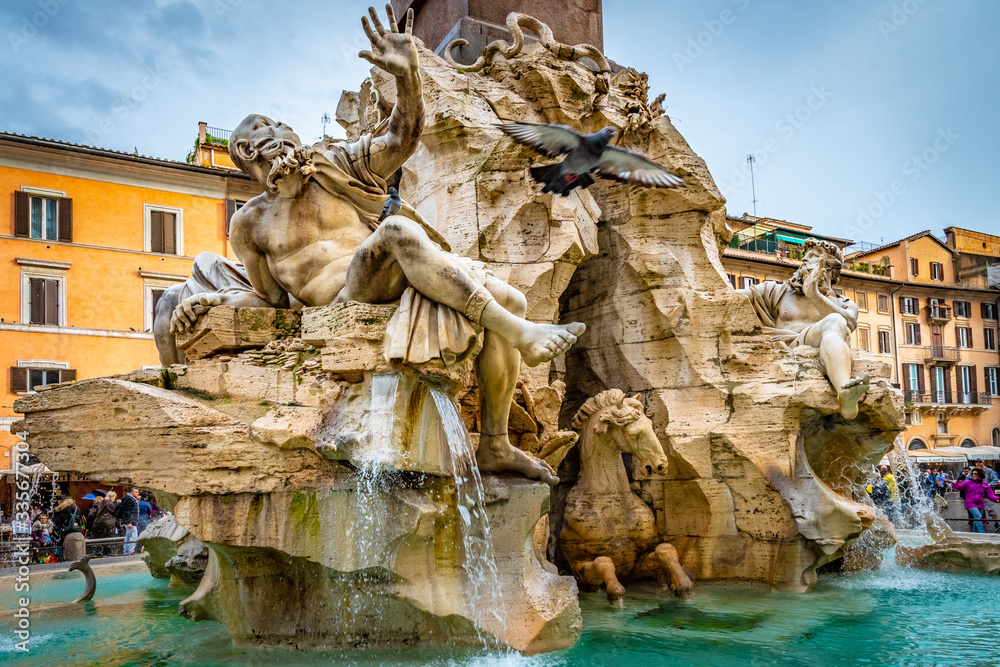 Rome, Italy. Fountain of Four Rivers (Fontana dei Quattro Fiumi) in Piazza Navona. 4 river gods sculptures of major rivers of papal authority continents. Nile, Danube, Ganges, Plata