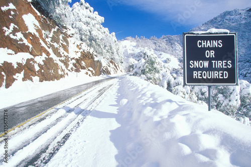 A sign that reads ÒChains or Snow Tires RequiredÓ