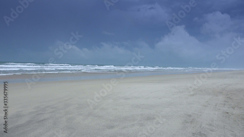Empty sandy beach on a rainy day - Atlantic ocean